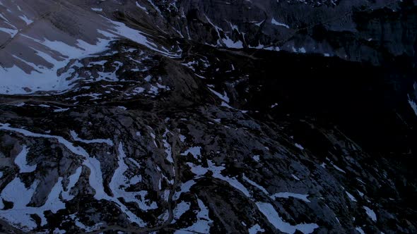 Drone Flying Near Tre Cime di Lavaredo Mountain Italy Dolomites at Sunset