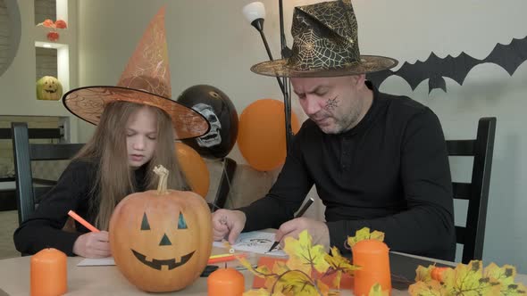 Child with Father Draw Pictures in Decorated Room at Home alt