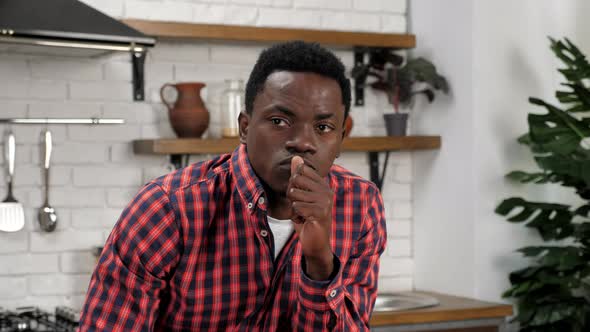 Thoughtful African American Adult Man Thinks About Solving Family Problems alt