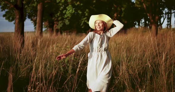 Happy Running Woman in Field