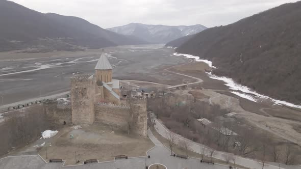 Aerial view of old Ananuri Fortress with two churches and picturesque view on river. Georgia 2021 alt