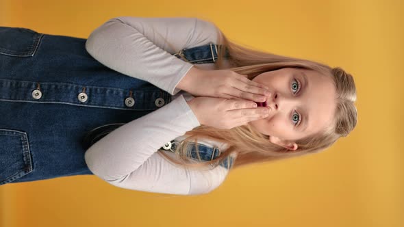 VERTICAL VIDEO POV Surprised Girl Shocked Amazement Positive Emotion Covering Mouth By Hands alt