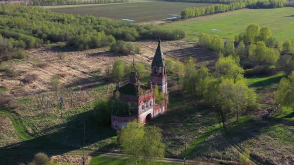 Flying around old ruined Russian church in a village.