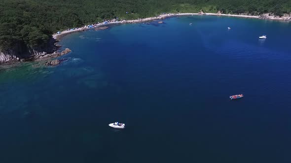 Flying Over the Blue Sea Surface in the Azure Lagoon alt