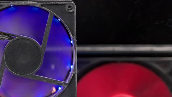 Spinning and Shaking Dusty 90 Mm Pc Fan Closeup with Flying Dust Particles alt