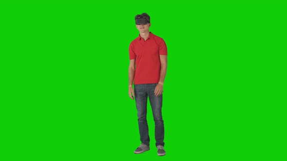 Man Expiriencing Different Emotions Using Vr Glasses