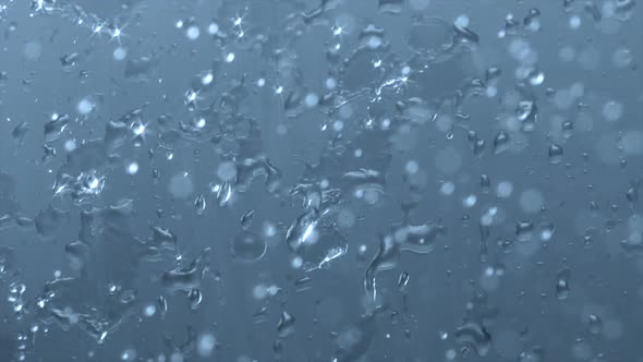 Heavy rain on window glass, Slow Motion alt