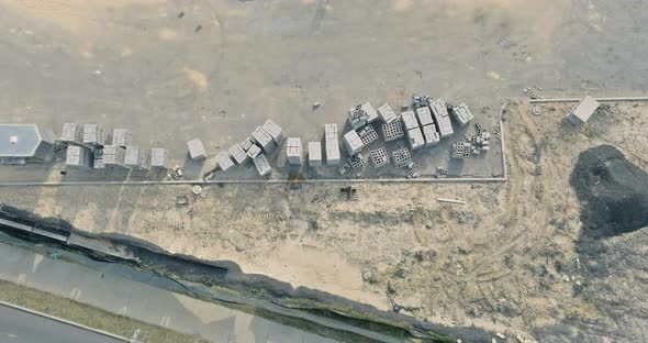 Top view on industrial zone from above of storage place construction materials alt