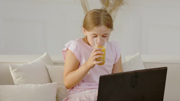 Girl Drinking Orange Juice alt