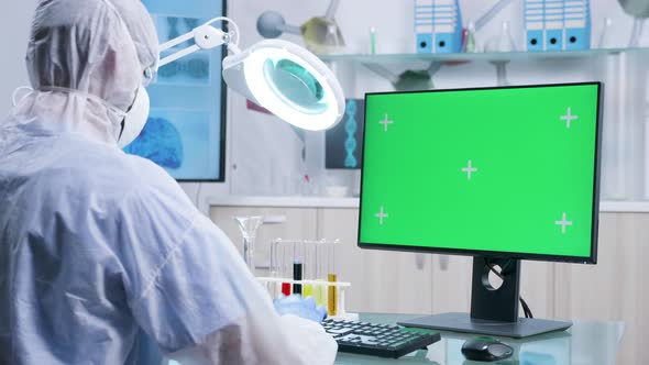 Chemist Working on Green Screen PC alt