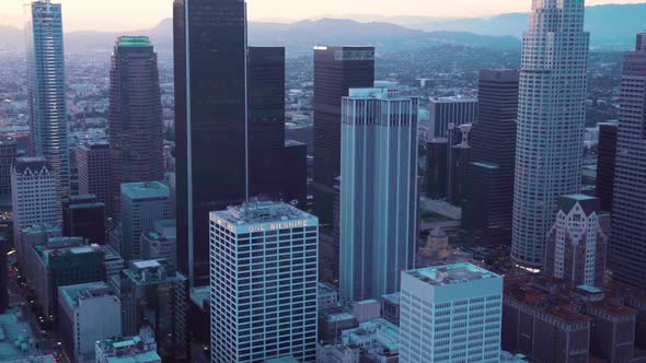 The skyscrapers of Los Angeles as seen from a helicopter after the sunset