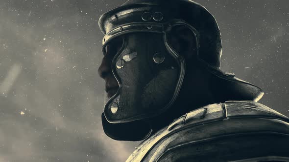Side View Of A Roman Soldier Standing Under Snow alt