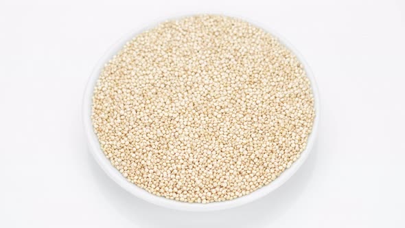 quinoa seeds on white background, rotating alt