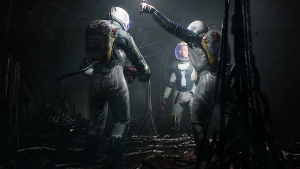 Astronauts Look Around In Nightmare Cave