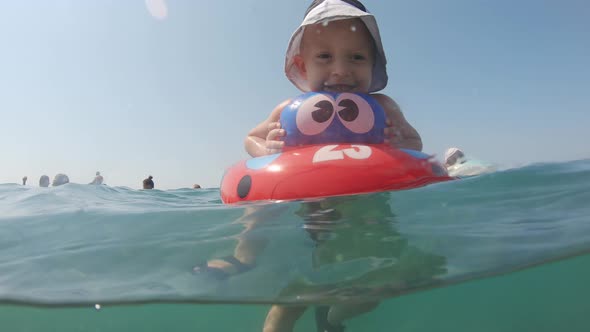 small boy swimming