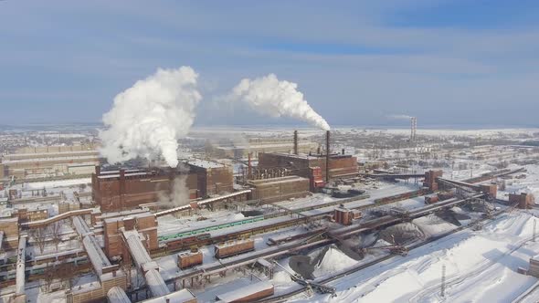 Smoke from Industrial Pipes Pollutes Air with Fumes alt