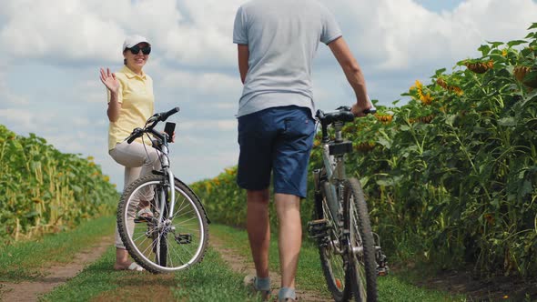 A Chance Meeting of Young People with Bicycles alt