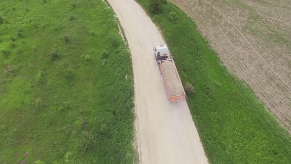 Aerial view of a truck with ballast driving alt