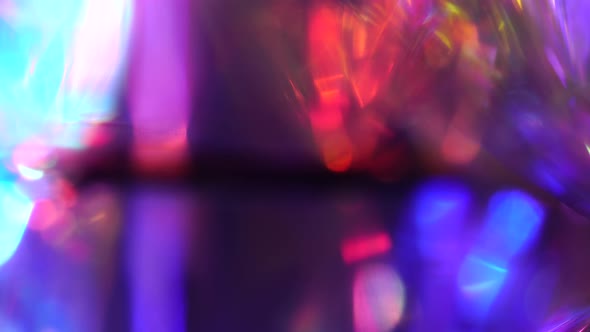 The bright color of the glowing lines. Festive Christmas background with light trails blurred effect alt