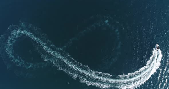 Aerial Top View of a White Pleasure Boat on a Summer Day alt