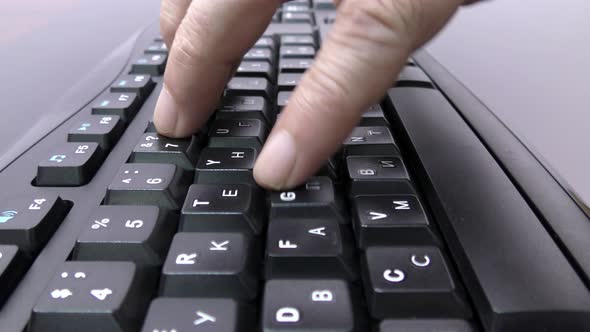 User typing text on the keyboard.