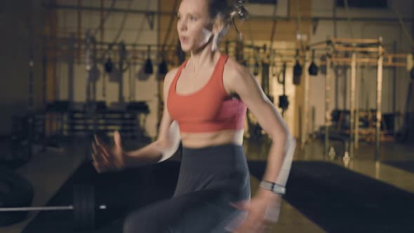Young Woman Running on the Spot alt