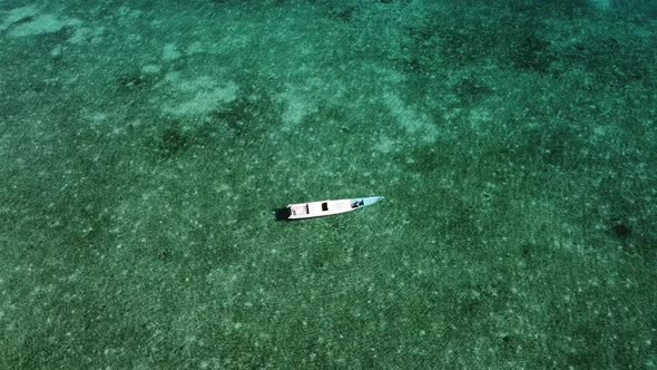 Small boat on a beautiful beach 2