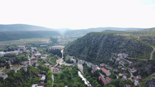 Aerial Drone View Of Stolac And Bregava River, Bosnia And Herzegovina 4K alt