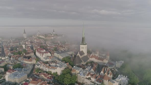 Aerial View Of beautiful old town in fog