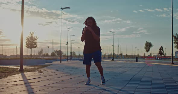 Motivated MMA Fighter is Training Outdoors in Early Morning Run and Fight  Prores alt