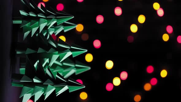 Christmas Trees Paper and Blinking Garland with Round Defocused Lights alt
