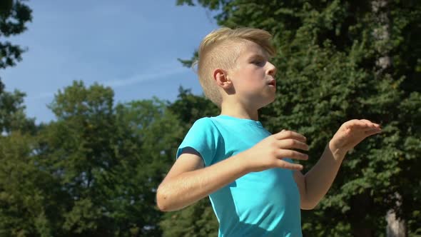 Caucasian Schoolboy Looking Disappointed Running Park, Losing Outdoor Game