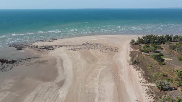 Aerial drone shot of White Sandy Beach, Blue Water and Rocks at Lee Point, Near Darwin, Northern Ter alt