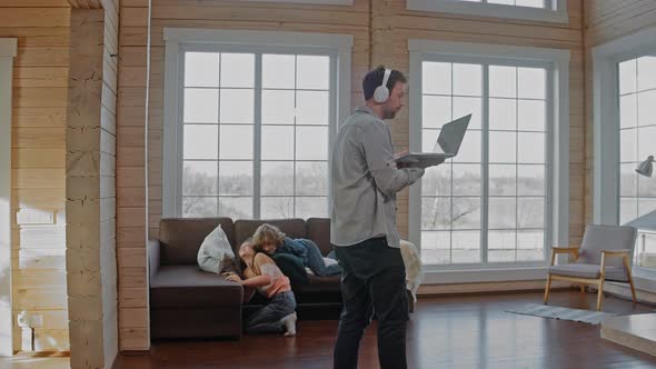 Man Walks Around the House Working on Video Call His Children are Fighting alt