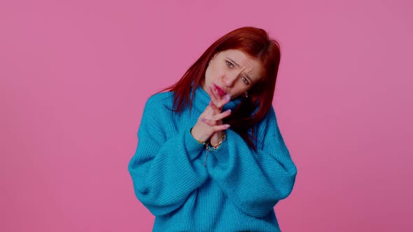 Redhead Cute Woman in Sweater Showing a Little Bit Gesture with Sceptic Smile Showing Minimum Sign alt