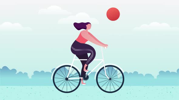 Lady is riding a bicycle