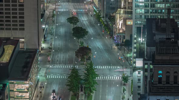 Time Lapse Birds Eye View Of Downtown City Streets With Traffic 