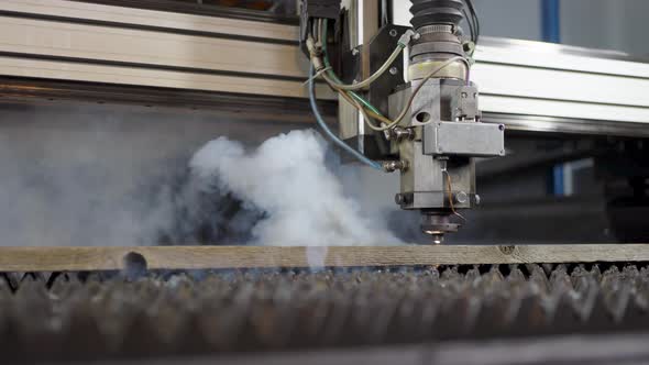 Industrial CNC Laser Cutting Machine Cuts Out Parts of Wood