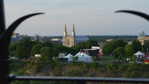 Notre-Dame Cathedral Basilica seen from behind a fence alt