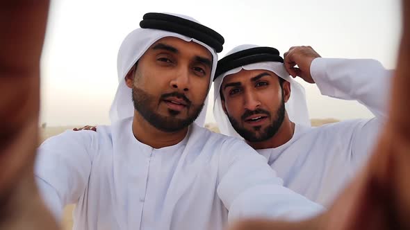 Young men spending a day in the dubai desert alt