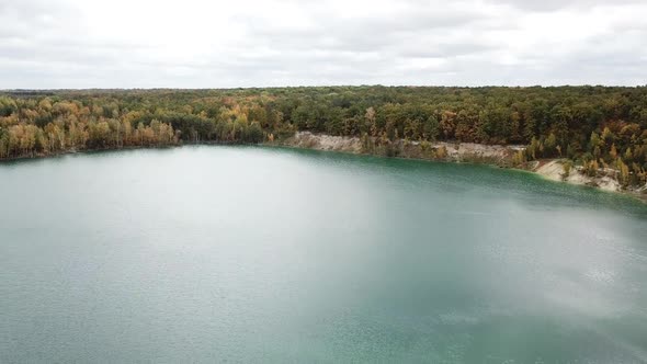 Aerial view over lake. Aerial view of forest with lake landscape alt