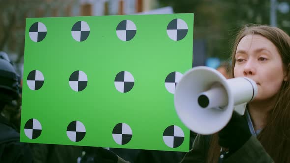 Activist Girl Feminist Shout Megaphone City Street. Crowd of Feminism Scream alt