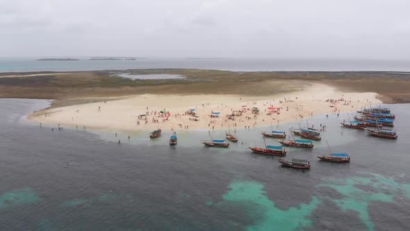 Aerial View Disappearing Island with Tourists and Boats in Menai Bay Zanzibar alt