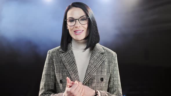 Show Woman. Female Entertainer, Presenter or Actor on Stage. Arms To Sides, Smoke on Background of alt