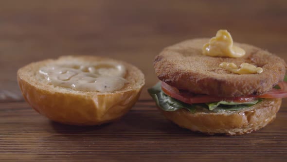 Hands of the Chef Making Burger alt
