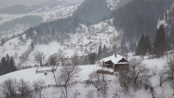Village Kryvorivnia covered with snow in the Carpathians mountains