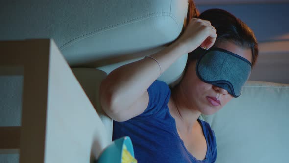 Vertical Video: Woman Sleeping with Eye Covering Mask alt