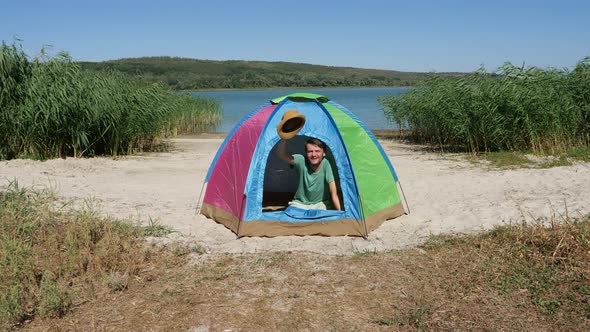 Positive Man Smiling Friendly and Showing Hello Waving Hat or Saying Hi and Good Morning Opening alt