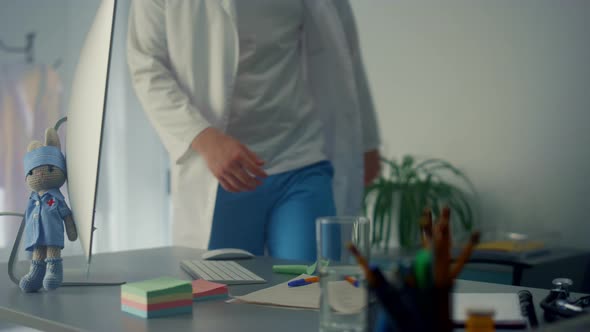 Doctor Have Videoconference Using Computer in Modern Clinic alt