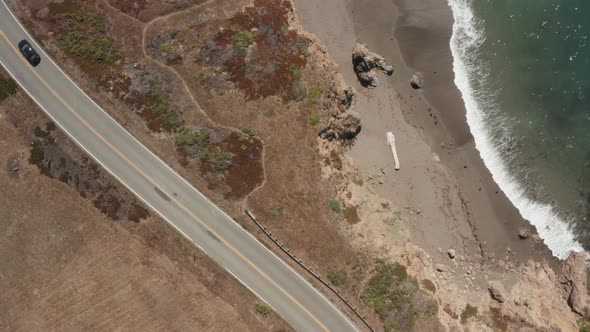 Looking down on Highway 1 and the beach ocean, Going from land to sea, Bodega Bay Northern Californi alt